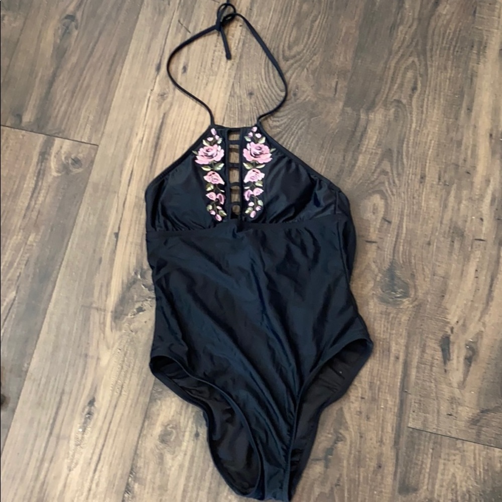 One piece bathing suit with purple flowers